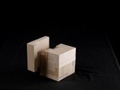 Photograph of bass wood cube model with shifted portions of the cube.