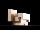 Photograph of bass wood cube model with shifted portions of the cube.