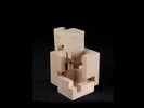 Photograph of bass wood cube model with shifted portions of the cube.