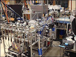 Isotopomer ratios measuring instrument on a big cart.