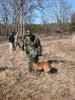 Demining dog with handler. 